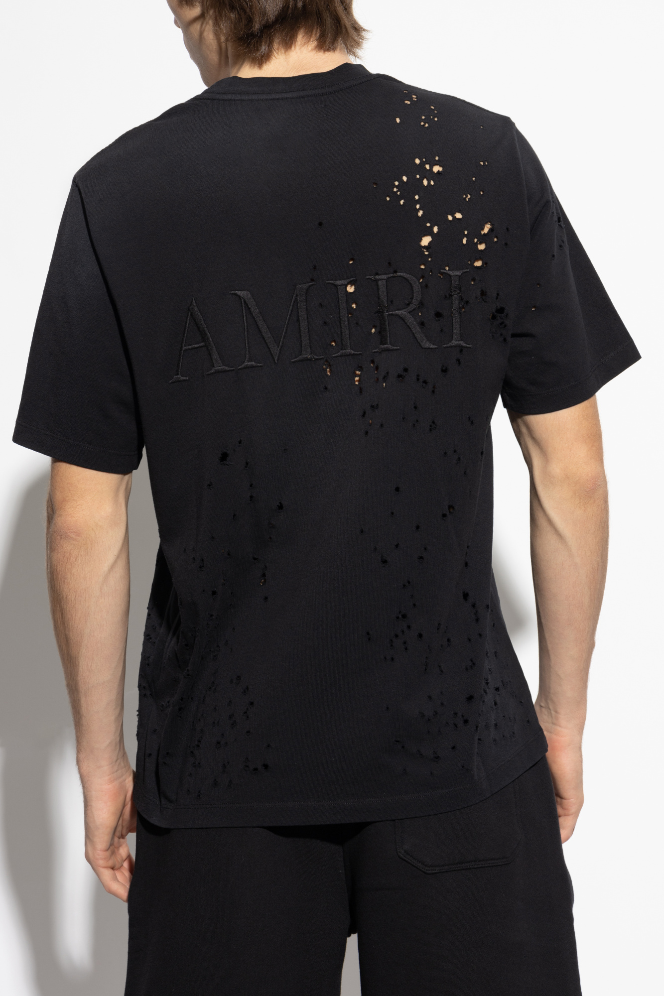 Tシャツ・カットソー Amiri T-Shirt AMIRI logo-print Cotton T-shirt | Black | FARFETCH PL